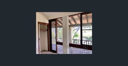 Double storey home with multiple living spaces - Photo 2