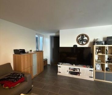 Appartement de 2,5 pièces au rez avec jardin - Foto 1