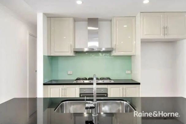 “Near New 4 Bedroom Family Home in Premium Location” - Photo 1