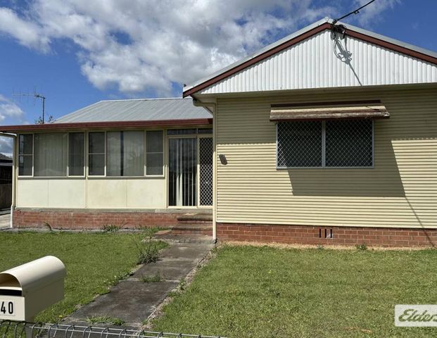 Taree West home - Photo 1