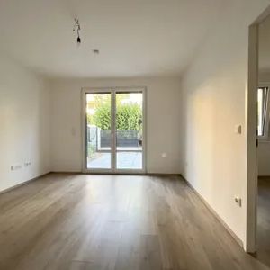 Moderne 2-Zimmer-Wohnung mit kleinem Garten und Kühlung! - Foto 1