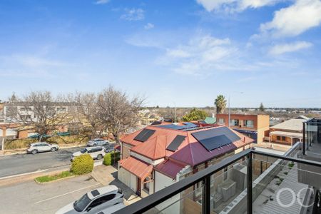 Open the Door to Elevated Living with City Views - Photo 4