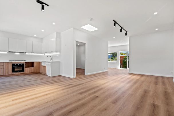 Immaculate Family Home - Freshly Renovated In Prime Location with Water Views - Photo 1