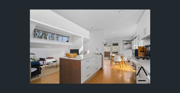 Stylish and Spacious Furnished Home with Private Garden and Modern Features - Photo 1