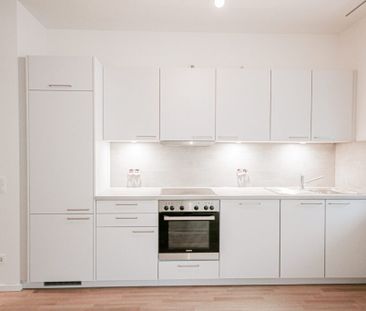 Mainblick! Moderne 2-Zimmerwohnung mit Einbauküche und Terrasse - Foto 3