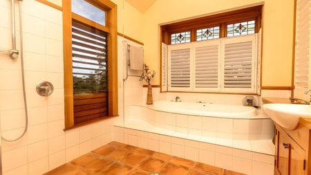 Exquisite 5-Bedroom Manor with Stunning Bush Views in Coatesville - Photo 2