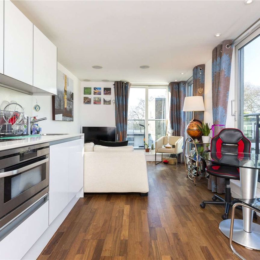 Fifth floor one bedroom apartment in this popular development - Photo 1