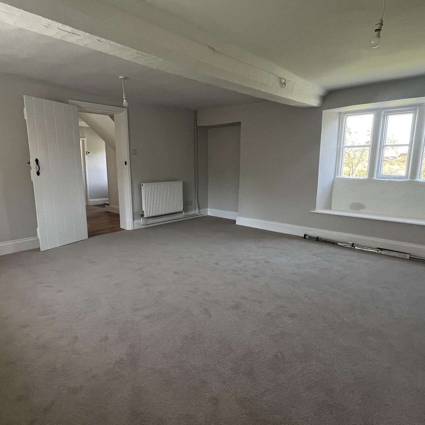 A beautifully renovated three double bedroom semi-detached period cottage situated in the sought-after village of Neston, surrounded by open countryside and som - Photo 1
