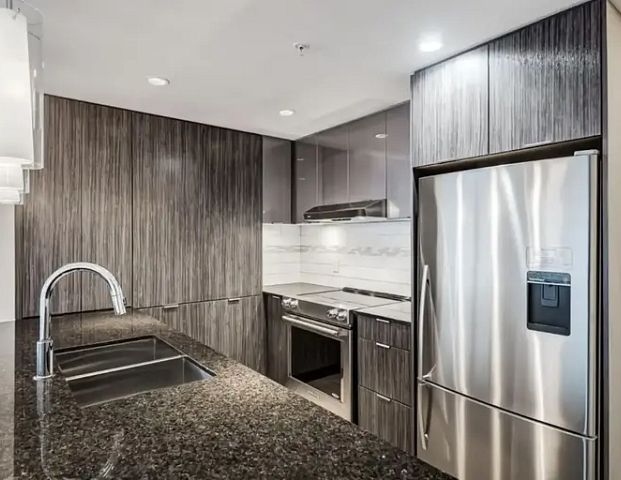 Large, corner 2 Bed, 2 Bath in luxury VOGUE tower | 1203 - 930 6 Avenue SW, Calgary - Photo 1