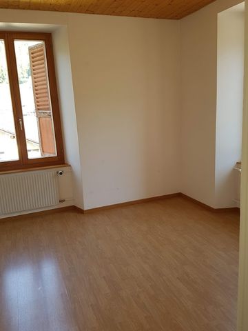 Appartement de 4,5 pièces au 2ème étage avec part au grand jardin commun - Photo 2