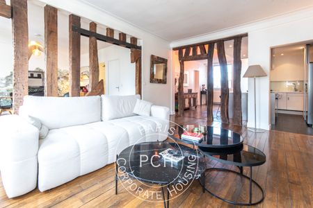 Tout savoir sur cet appartement dans le quartier Sainte Avoie, à Paris 3ème - Photo 2