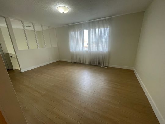 Beautifully Renovated Two-Level Home - Photo 1