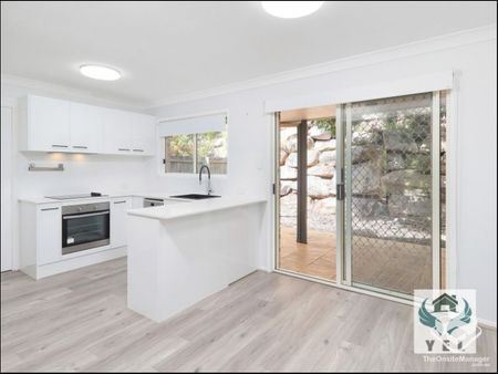 Modern 3-Bedroom Townhouse with New Kitchen & Floors + Big Yard - Photo 4