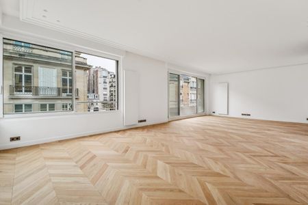 Location Appartement 5 pièces 176m² PARIS 16ème - Photo 2