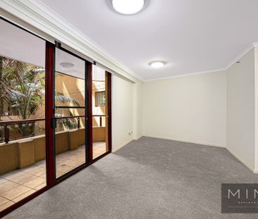 Sleek One Bedroom in Millennium Towers with Parking! - Photo 1