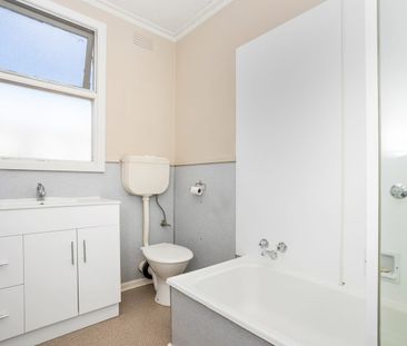 Neat, Comfortable & Conveniently Located - Photo 6