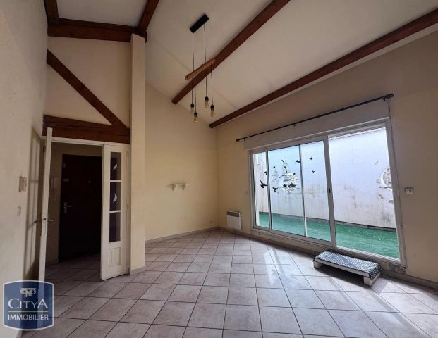 Appartement à louer 4 pièces 71.4m² - Photo 1
