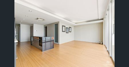 Executive-Style CBD Apartment with Stunning 16th-Floor Views - Photo 2
