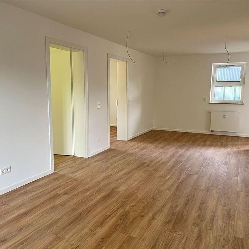 Neuwertige 3-Zimmer-Wohnung mit Südwestbalkon + TG-Stellplatz! Stadtnah + grün! - Photo 1