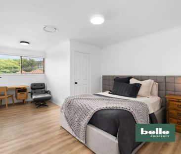 Stylish Top-Floor Apartment with Park Views - Photo 1