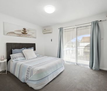 Freshly Updated 2-Bedroom Gem with Modern Comfort & Natural Light - Photo 5