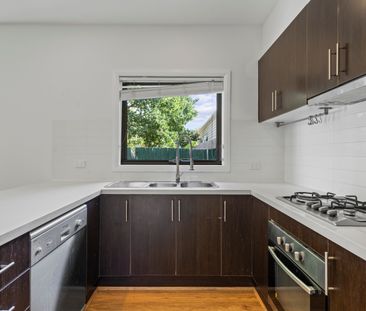 Stylish Brick Unit with Modern Comforts & Easy Living - Photo 3