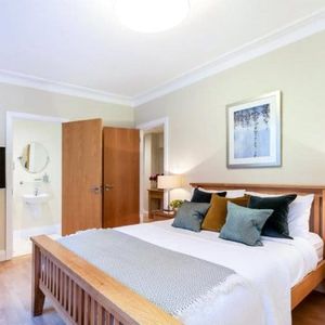 A two bedroom apartment of approximately 1,281 square feet. - Photo 2