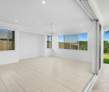 Modern 4 Bedroom Family Home on Low Maintenance, Fenced Block - Photo 3