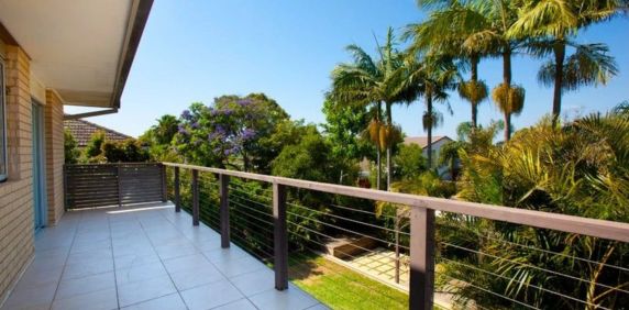 Charming Three-Bedroom Unit in Tranquil Yet Convenient Location - Photo 2
