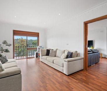 Spacious Family Home with Sweeping Treetop Views - Photo 5