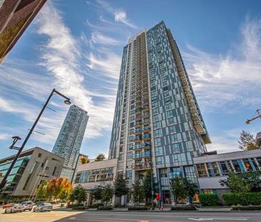 2 Bed Condo | Surrey University District | Parking • Den - Photo 5