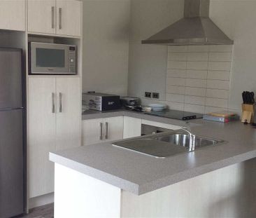 Fully Furnished Brick Townhouse – Walk to University This well-pres... - Photo 6