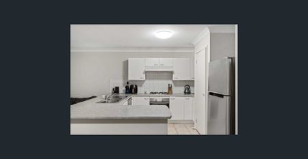 Spacious Family Home in Prime St Helens Park Location - Photo 4