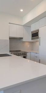 "Brand New Spacious 2/Bed 2 Bath Condo By SkyTrain" - Photo 4