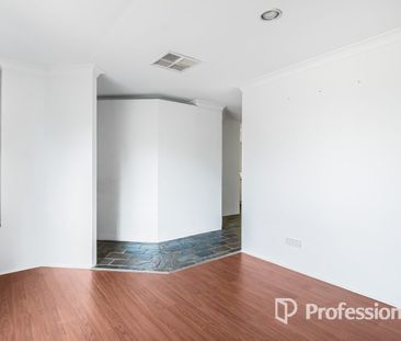 Spacious 4-Bedroom Family Home with Multiple Living Areas - Photo 3