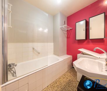 Location Appartement 3 pièces 65m² ST ETIENNE 42100 - Photo 3