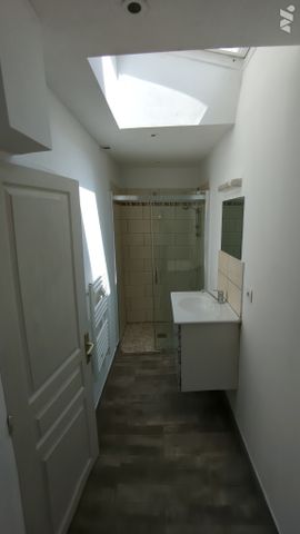 Appartement au rez-de-chaussée en plein bourg de BRICQUEBEC - Photo 3