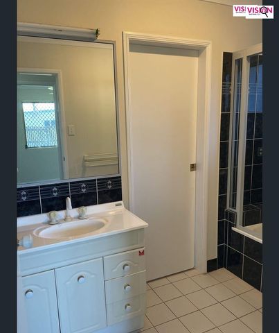 This neat and tidy low-set home offers comfortable coastal living in a quiet location. - Photo 5