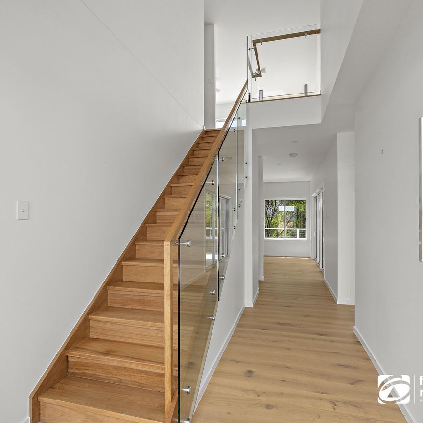 BRAND NEW STUNNING HOME WITH BREATHTAKING VIEWS OF MORETON BAY AND STRADBROKE ISLAND - Photo 1