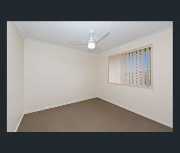 Spacious Family Home with Air-Conditioned Living & Large Backyard - Photo 6