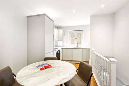 A wonderfully bright and modern one bedroom apartment in a prime location. - Photo 2