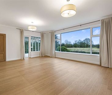 A deceptively spacious, refurbished detached bungalow set within ap... - Photo 1