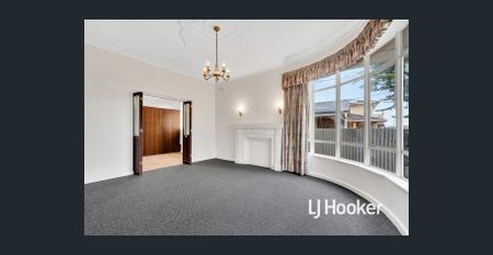 UPDATED 3 BR HOME WITH HUGE RUMPUS ROOM, & HEAT & COOL! - Photo 3