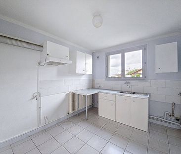 Location appartement 4 pièces 69 m² à Bourg-en-Bresse (01000) - Photo 4