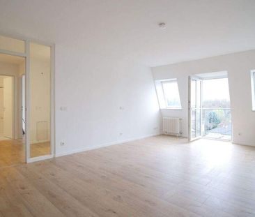 Herrliche Dachgeschoss 2-Zimmer-Wohnung mit Balkonen - Foto 1