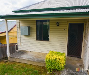 WELL PRESENTED 2 BEDROOM COTTAGE - Photo 1