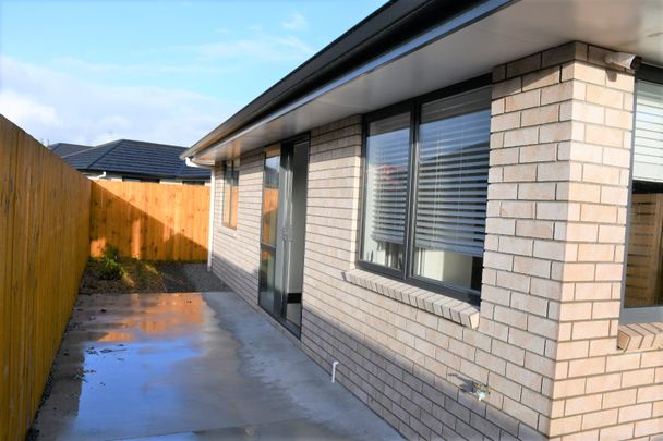 This near new attached two bedroom home offers a spacious open plan kitchen / dining and living. - Photo 1