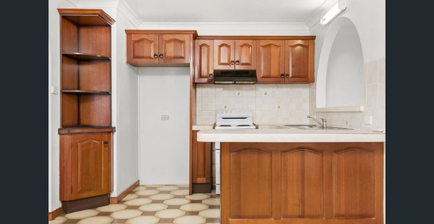 Tidy Three Bedroom Home in a Great Location! - Photo 1