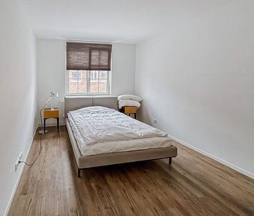 Großzügige und helle 2-Zimmer-Wohnung mit Dachterrasse - Foto 1