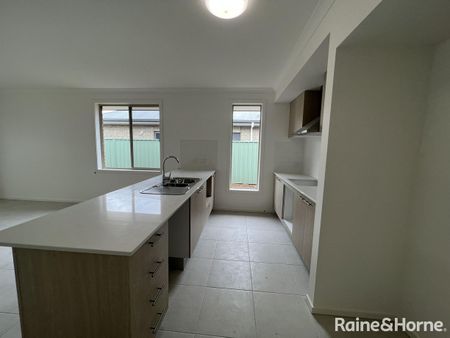 Four Bedroom Home in Evanston Gardens! - Photo 5